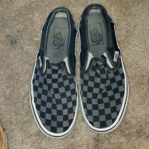 Checked Black and Gray Vans.